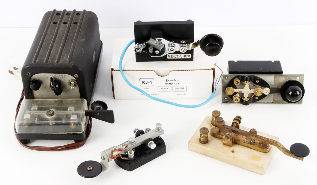 LOT OF 5 TELEGRAPH KEYS BENCHER: Lot of five (5). 1) Bencher RJ Series hand key. 6 X 3.5 inches. Very good condition. 2) Monkey telegraph key. Made by the Electric Eye Equipment Co. 11 X 4.5 inches. Very good condition. 3) Telegraph 
