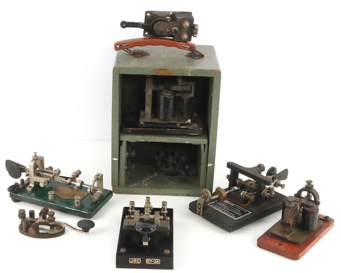 LOT OF 7 TELEGRAPH KEYS WESTERN UNION & MORE: Lot of seven (7). 1) Western Union portable telegraph. Light blue, has logo "Western Union Everywhere" in yellow. 6 X 7.25 X 9.5. Very good condition. 2) N.A.Tel.Co. made telegraph key. Patented 1895.
