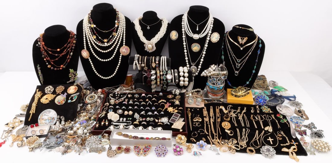 ESTATE COSTUME JEWELRY OVER 12 POUNDS: Estate costume jewelry. Many named pieces from Monet, Florenza, and more. Large lot of 18kt gold-plated chains are also included. As photographed.