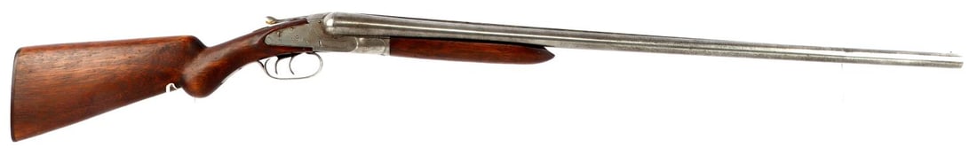 BAKER GUN CO DAMASCUS 12GA SIDE BY SIDE SHOTGUN: Antique Baker Gun Company 12-gauge side by side shotgun with 32-inch Damascus barrels. Engraved action with double trigger. Good condition. Functions without issue. There is play in the forend lug due