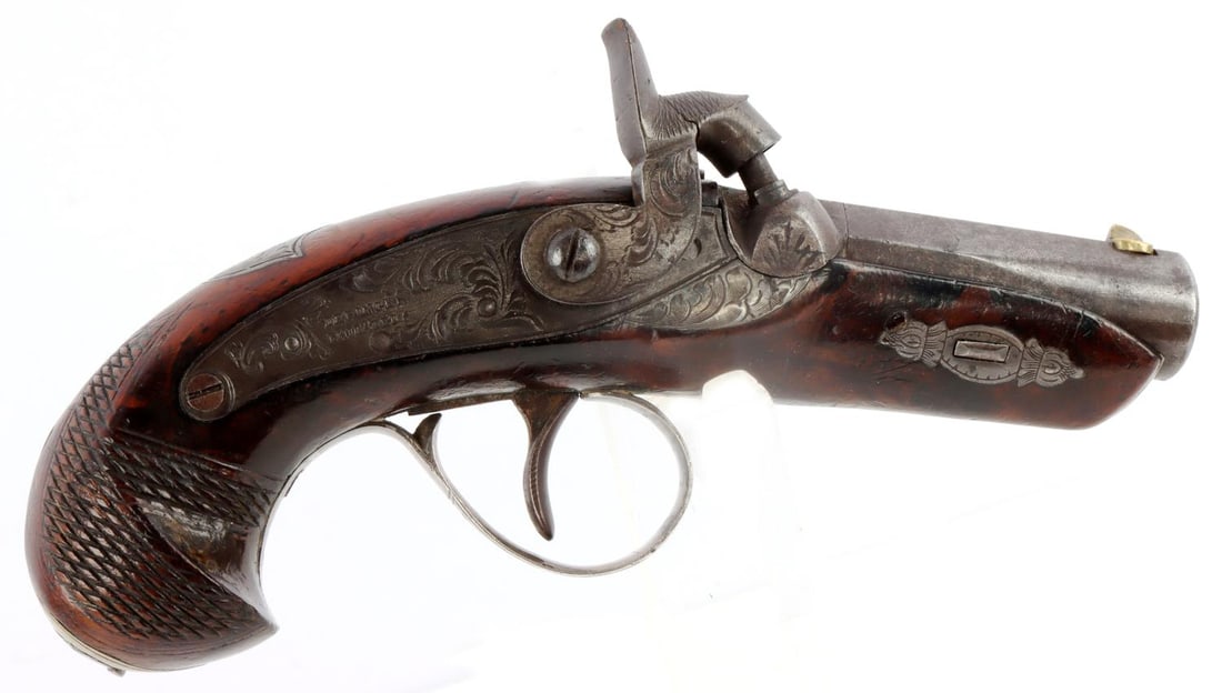 N. CURRY MARKED DERRINGER PERCUSSION PISTOL: Barrel marked "N. Curry Francisco Agents". Barrel measures 2 1/2 inches full length 5 7/8 inches. Fully functional cocking mechanism. Bore is dim and diameter measures 9.81mm. This lot has a reserve.