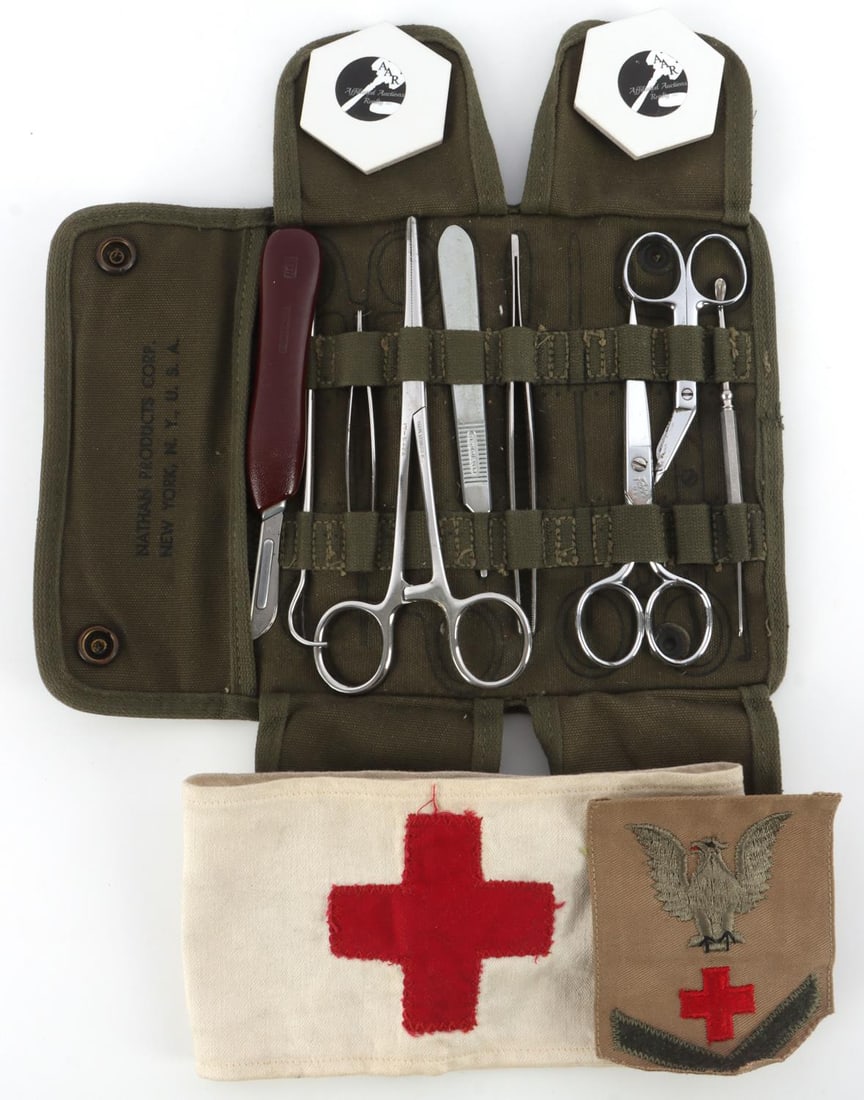 WWII SURGICAL KIT & RED CROSS ARM BAND: All very good original condition with a pharmacist mate patch. Appears complete.
