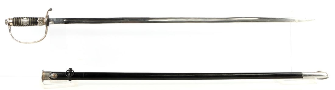 WWII GERMAN THIRD REICH SS DEGEN SWORD: Nickel-plated steel blade with no maker's mark. SS runes engraved on crossguard. Silver plated guard and fittings. Measures 40 inches overall. Post-war production. This lot has a reserve.