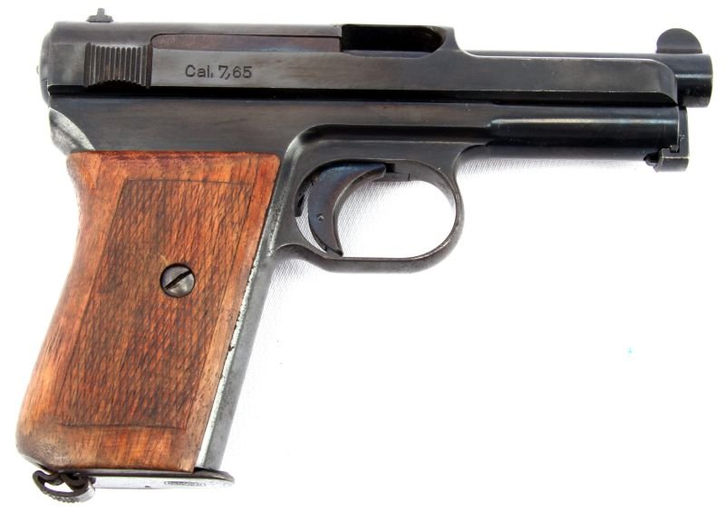 MAUSER MODEL 1934 7.65MM PISTOL: Mauser Model 1934 7.65 mm (32 ACP) pistol. Bore is good and clean, finish is about 90%, and grips are well handled, but good condition. Overall very good condition. Caliber: 7.65 Serial #: 488797