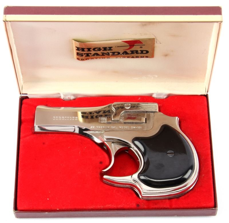 HIGH STANDARD DM-101 DOUBLE DERRINGER NICKEL PLATE: Nickel plated High Standard DM-101 over / under .22 Magnum double derringer, in original presentation style case. Gun is unfired, in near new condition. Caliber: .22 Magnum Serial #: 2204306