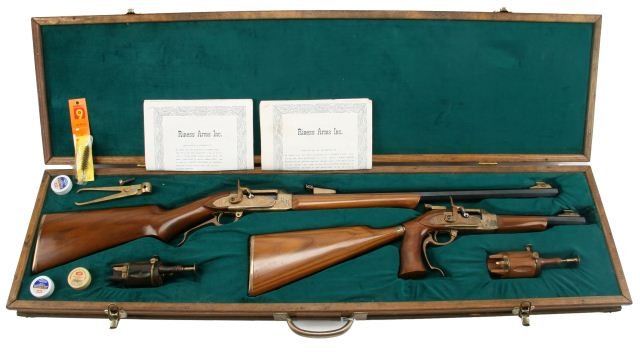 SET RINESS ARMS BLACK POWDER RIFLES: Set of rifles by Riness Ams Inc., complete with COA's from Riness Arms. COA's state that the full size rifle is one out of thirty-nine produced, and the short barrel is one of ten or twelve in its pro