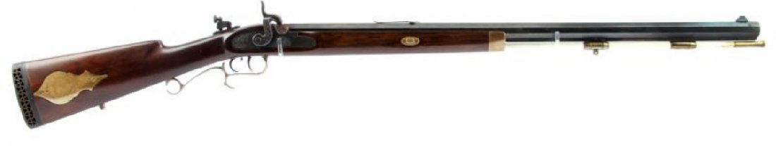 THOMPSON CENTER ARMS .50 CALIBER MUZZLELOADER: Thompson / Center arms .50 caliber percussion muzzle loading Hawken style rifle. 29 inch octagonal barrel, aperture sight, and fiberglass ramrod. Stock is very good, bluing about 60%, and bore appears