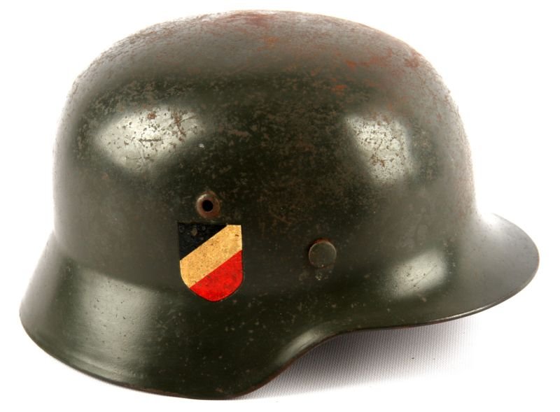 WWII GERMAN M-35 DOUBLE DECAL WEHRMACHT HELMET: WWII German Wehrmacht M-35 double decal helmet. Tri color National shield and Wehrmacht decals are good and clear, with little loss. Marked "Q 68" on inside right of skirt, and "3299" on back of skirt