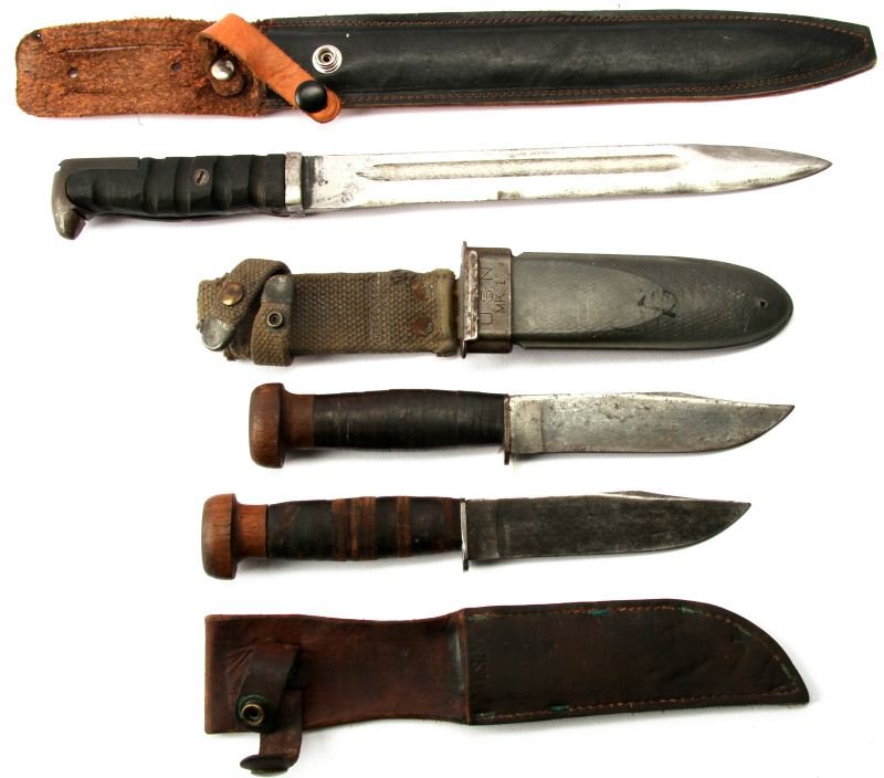 USN MARK 1 MK1 & GARAND MADE FIGHTING KNIFE LOT: MK1 blades are believed to be Geneva Forge each with wood pommels , one fiberglass sheath the other leather both are very good, the second is a theatre converted Garand bayonet it also very good.