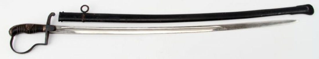 IMPERIAL GERMAN NCO SABER: Imperial German NCO saber. 32 inch single fuller nickel plated blade. Steel hilt with wire wrapped black wood grip, and "P" knuckle bow. Black enameled rolled steel scabbard. Blade is very good. Hilt 