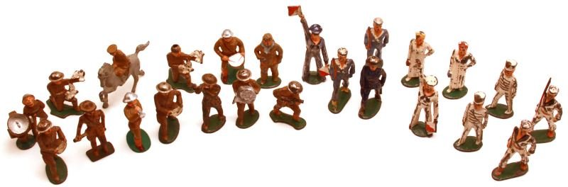 LARGE GROUPING OF BARCLAY & MORE TOY SOLDIERS: Includes total of twenty four toy soldiers (Barclay and more), (Navy, Infantry, nurses, and band). Over all in fair to good condition, one missing helmet.