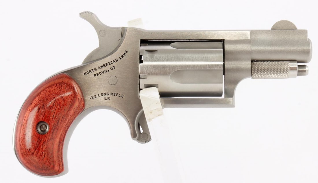 NORTH AMERICAN ARMS 22LR 5-SHOT REVOLVER NIB: New in box. 22LR 5-shot revolver with 1-1/8? barrel. Model: NAA-22LR. SKU: 744253000034. FFL required for transfer. No international shipping. Know your state's laws before bidding. Caliber: 22LR Seri
