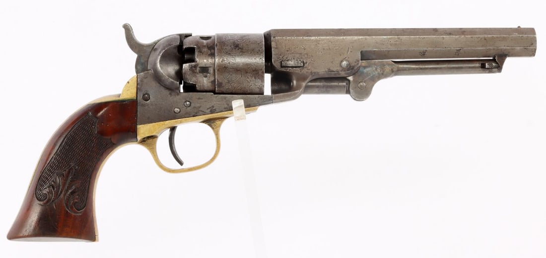 COLT NAVY 1862 POCKET REVOLVER .36 CAL 5.5IN: Original Colt model 1862 pocket revolver of Navy caliber. Octagon barrel, 5.5 inches, with New York address and brass cone front sight. Stagecoach robbery scene engraved on five-shot cylinder. Two-pie
