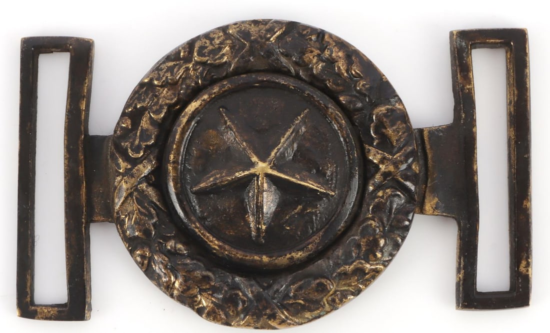 CIVIL WAR STATE OF TEXAS BELT BUCKLE: State of Texas brass belt buckle, in two interlocking parts. Shows star of Texas on oak wreath. Confederate-era design modeled off Revolutionary Texas buckle. Back reads "TEXAN IRON WORKS 1861." There