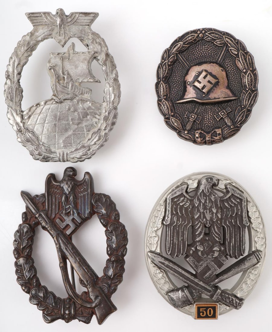 WWII GERMAN LOT OF 4 MILITARY BADGES: Lot of four (4) assorted WWII German Military Badges. Auxiliary Cruiser badge, converted to screw back. 2 1/8 inches. Infantry Assault Badge. 2 1/4 inches. WWII German Wound Badge. 1 5/8 inches. Gener