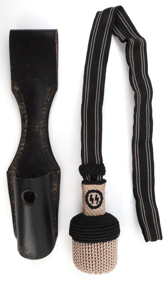 WWII GERMAN BLACK LEATHER BAYONET FROG & SS KNOT: WWII German dagger accouterment. Black leather frog for dress bayonet. Very good condition. 8 inches for the frog, and 18 inches for the portepee. Frog is stamped, 1944. SS, RZM.