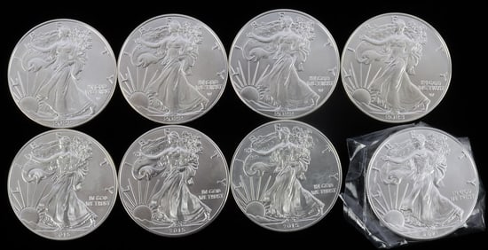 LOT OF 8 MIXED DATE SILVER AMERICAN EAGLE BU COINS