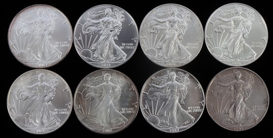 LOT OF 8 1 OZT SILVER AMERICAN EAGLE BU COINS