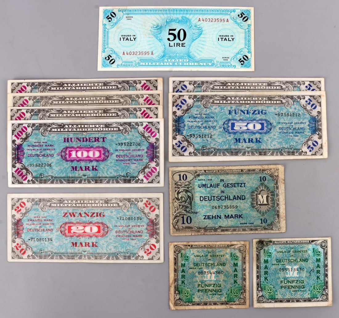 ALLIED MILITARY PAYMENT CERTIFICATES LOT OF 11: Lot of eleven (11) Allied Military Payment certificates. Lot includes ten German marks notes, including hundreds, fifties, and 'short' Pfennig notes, as well as one Italian fifty lire. Includes series