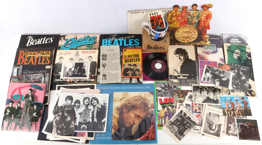 VINTAGE BEATLES COLLECTION PHOTO CD VINYL LOT 70: Lot of seventy (70) pieces. Vintage Beatles memorabilia collection in good condition. Includes 22 press and collectible photographs, 32 postcards and clippings, and 1 boxed coffee mug. Additionally, 1