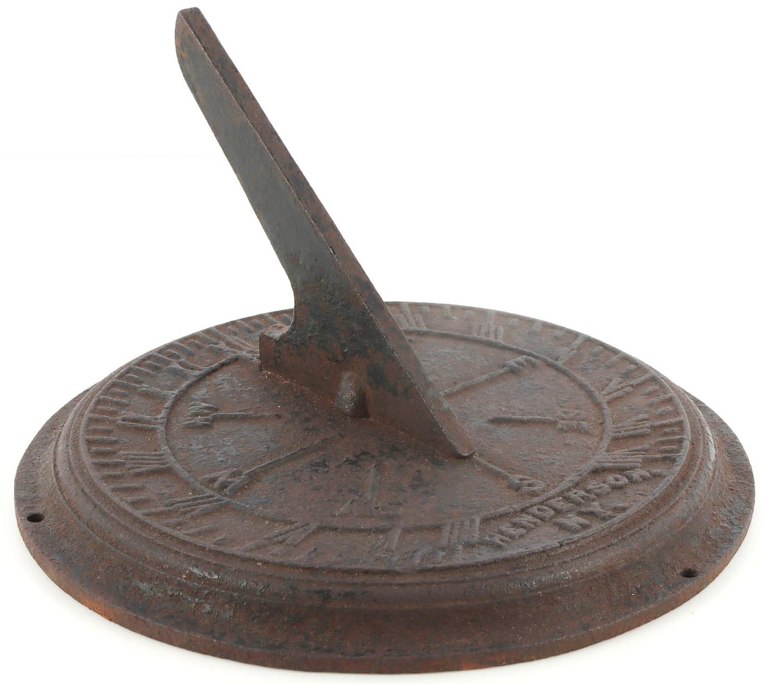 CAST IRON SUNDIAL 18TH CENTURY MODEL: Cast iron sundial modeled off of design from the 1790s, cast later. Sundial includes all numbers, 4 depicted in the watchmaker fashion (IIII), cardinal directions and intermediate directions. 10-inch