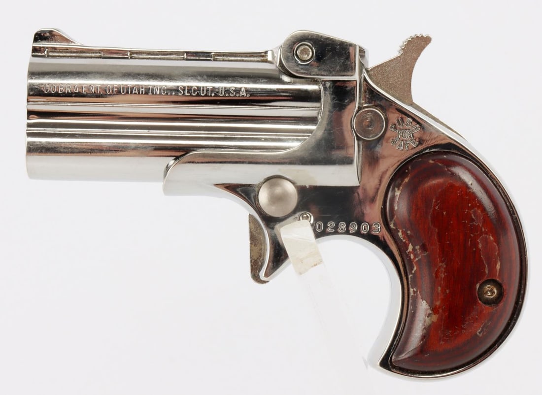 COBRA C22M NICKEL 22 MAGNUM DERRINGER: Nickel finish with two-piece wood grips. Good condition. Functions without issue. Includes original box and papers. FFL required for transfer. No international shipping. Know your state's laws before 