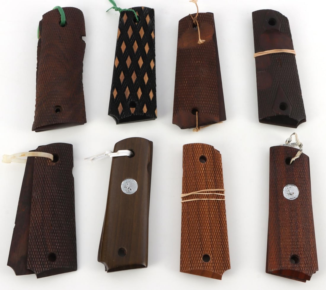 PAIR OF 8 CHECKERED WOODEN GRIPS FOR COLT 1911: Lot of eight (8) pair of checkered wooden grips for Colt 1911 pistols. Two pair feature the silver Colt medallion, one is smooth wood. Lot is in good condition.