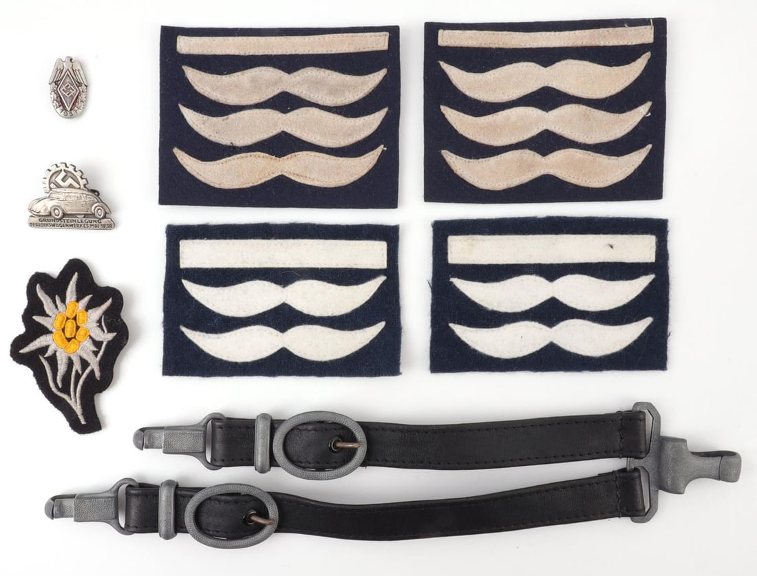 WWII GERMAN PATCH PIN & DAGGER HANGER LOT OF 8: Lot of eight (8) pieces. Includes black leather dagger hanger with pebbled zinc fittings stamped "DRGM," four Luftwaffe patches, edelweiss patch, Volkswagen pin and Hitler Youth 1937 event badge. Good