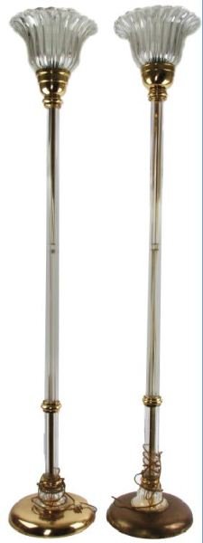 CONTEMPORARY PAIR VETRI MURANO GLASS FLOOR LAMPS: Vetri Murano glass floor lamps, matching pair. Torchere style, with reeded shaft and flower form globe in clear. Polished brass fittings and base. 66 inches tall. Very good condition.