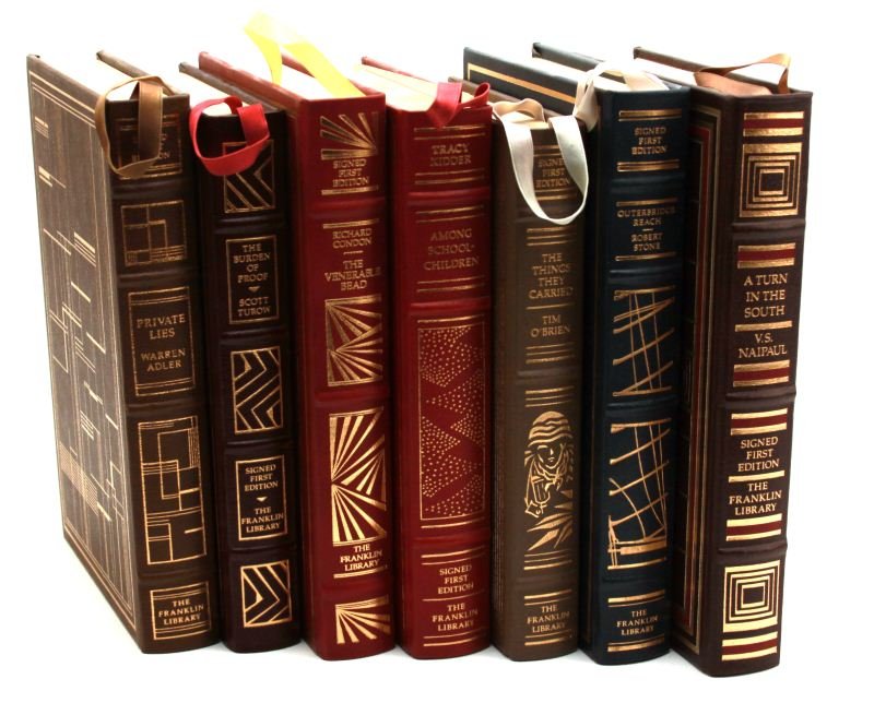 7 FRANKLIN LIBRARY SIGNED FIRST EDITION BOOKS: Collection of hard bound leather and gold decor bindings. Authors include: Richard Condon (The Venerable Bead), Robert Stone (Outerbridge Reach), Scott Turow (The Burden Of Proof), Tim O' Brien (The T