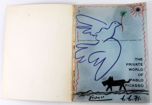 PICASSO DRAWING IN PRIVATE WORLD OF PICASSO W/ COA: Original dog and dove pastel drawing by Pablo Picasso (Spanish, 1881-1973) on the inside cover of "The Private World of Pablo Picasso" by David Douglas Duncan (1958). Singed in the bottom center of th