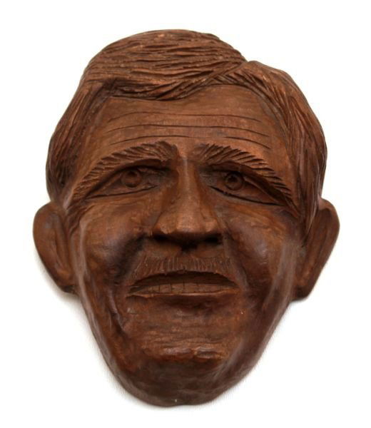 CLARENCE STRINGFIELD CARVED ARCHIE CAMPBELL HEAD: Clarence Stringfield (American, 1903 - 1976) folk art carved wood portrait of Art Dealer Archie Campbell. Reverse signed in brown felt-tip pen and "ARCHIE CAMPBELL" in pencil. In excellent to very goo