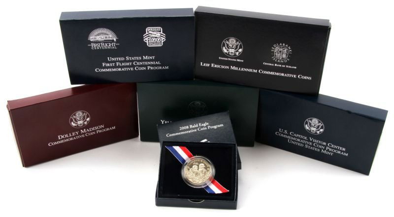 SILVER US MINT COMMEMORATIVE COIN SET OF 6: 2000 Leif Ericson Millennium commemorative two coin proof silver set, 2003 First Flight uncirculated clad half dollar coin, 2001 Capitol Visitor Center proof clad half dollar, 2008 bald eagle proof cl