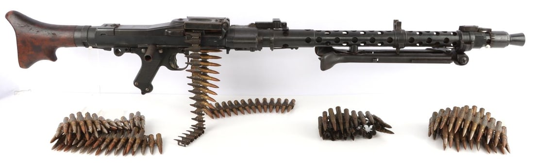 WWII GERMAN 1943 MG-34 DISPLAY GUN & AMMO BELTS: Deactivated MG-34 with bipod and four (4) linked ammunition belts. Wartime parts on a solid block aluminum receiver. Plugged barrel. Trigger, bipod, sights and top cover are operable. Butt stock, barr