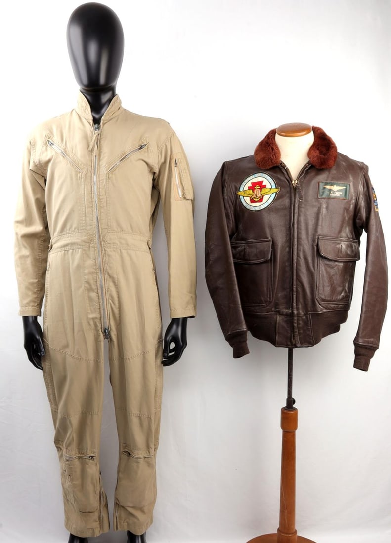 VIETNAM US NAVAL AVIATION G-1 JACKET W COVERALL LG: Lot of two (2) Vietnam War-era uniform pieces. First, a size 42 US Navy leather flight jacket with 13 sewn-on patches. Tailor's label reads "Jacket, Flying, Man's, Intermediate, Type G-1 Ralph Edwards
