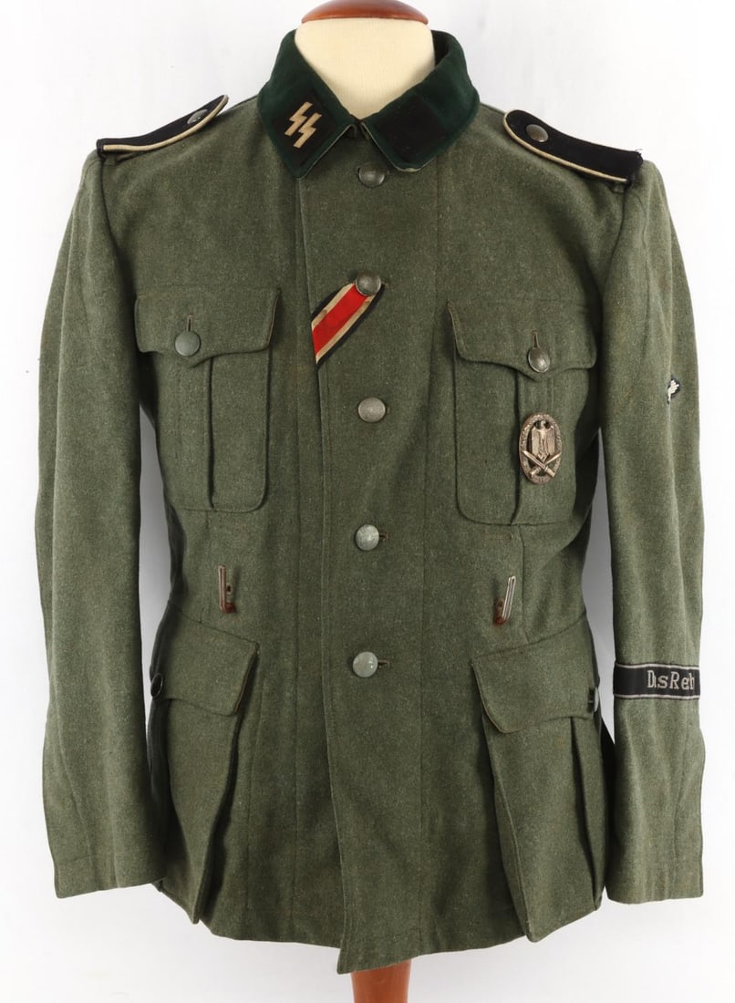 WWII GERMAN WAFFEN SS M40 FIELD TUNIC DAS REICH: Wool tunic with assault badge scooped back type. Parteiadler patch left arm. Rayon "Das Reich" cuff title. Very good condition overall. Some buttons may have been replaced. Size ink stamped 43, 45, 96