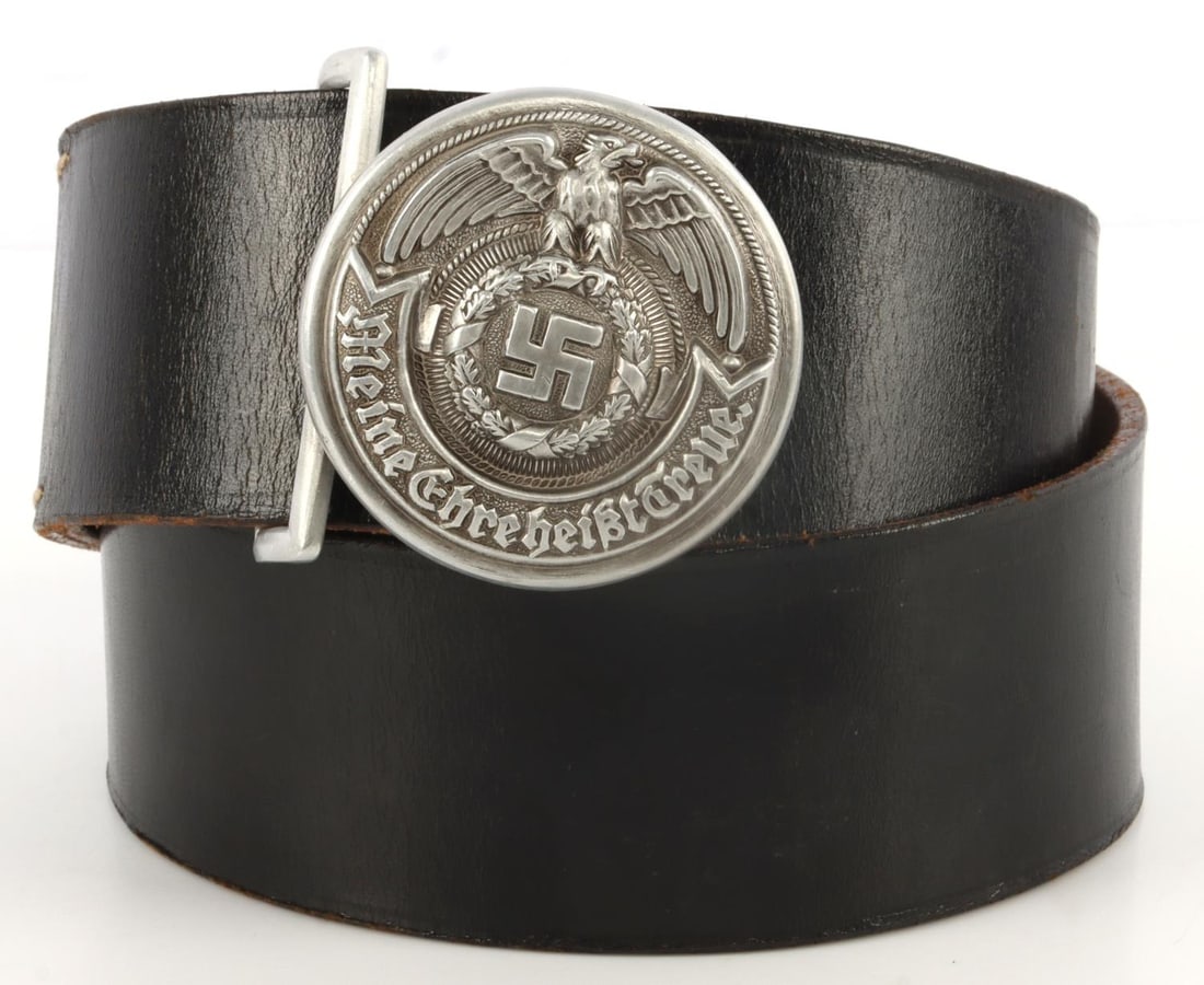 WWII GERMAN THIRD REICH SS BROCADE BELT BUCKLE: Aluminum belt buckle with leather belt. Buckle marked SS RZM 35/40 OLC. Belt marked SS RZM. Buckle measures 1 7/8 inches. Belt measures 48 inches. Very good condition. This lot has a reserve.
