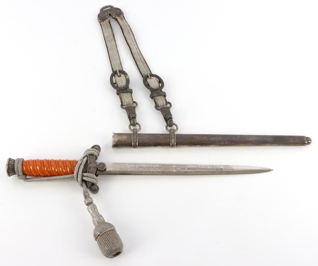 WWII GERMAN REICH ETCHED EICKHORN ARMY DAGGER: Nickel-plated etched steel blade with Eickhorn maker's mark. Bakelite grip. Crossguard, pommel and scabbard are silvered nickel.14.5 inches. Hanger clips are zinc and marked DRGM. Tight fit in scabbar
