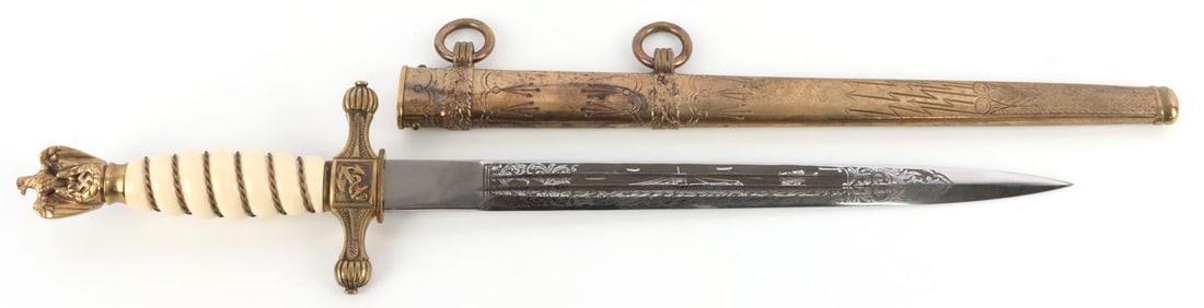 WWII GERMAN THIRD REICH KRIEGSMARINE DAGGER: Engraved blade. Brass scabbard, pommel, and crossguard. Celluloid grip. E & F Horster make. 14 3/8 inches. Very good condition. This lot has a reserve.