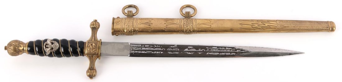 WWII GERMAN POLICE WATER PROTECTION DAGGER BOKER: Engraved steel blade with brass crossguards and pommel. Bakelite grip with brass wire wrap. Housed in brass scabbard. Approx. 14.5 inches. On of the finest examples. No movement or play. Very tight. L