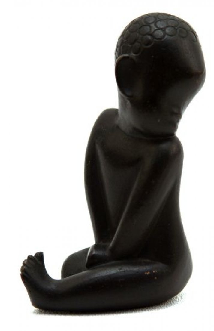HAGENAUER VIENNA BRONZE AFRICAN CHILD FIGURE: Hagenauer, Vienna. African child, c. 1930. 3 inches tall. Designed by Franz Hagenauer. Bronze, black patina, partly polished. Marked: wHw, MADE IN / VIENNA /AUSTRIA, HAGENAUER/ WIEN , HANDMADE (stampe