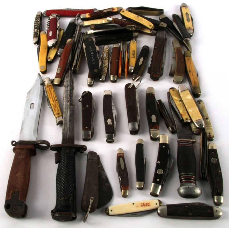 LARGE BOX OF FIXED BLADE AND POCKET KNIFE LOT: Over 50 blade sin this grouping, Shrade, Boker and others, includes a Garand bayonet, AK47 bayonet and a Remington fixed blade, balance are folding pocket knifes in fair condition, many have sharpened