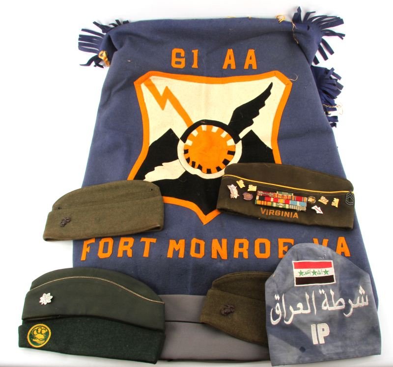 MULTI CONFLICT MILITARY COLLECTABLE LOT: Collection consisting of two USMC WWII overseas caps both with EGA one with mothing, Civilian Conservation Corp overseas cap, USAF cap with LT. COL. insignia, grey airline pilot cap, Iraqi Military Po