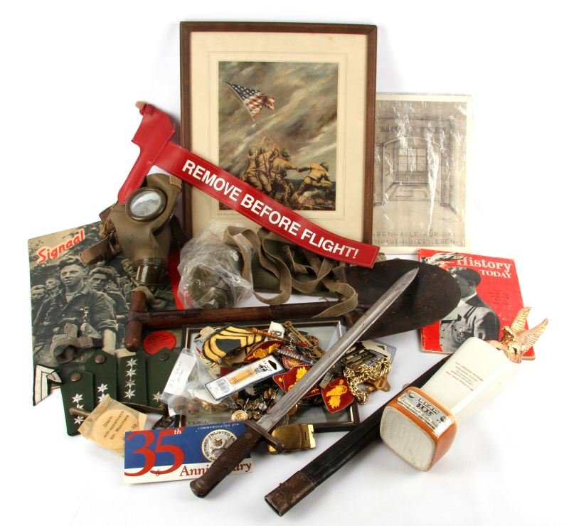 MULTI CONFLICT MILITARY COLLECTIBLE LOT: Includes helicopter Remove Before Flight ribbon, T handle U.S. Army entrenching tool, framed Iwo Jima print, M31 gas mask, original German Signal magazine, 1964 History today magazine with night of th