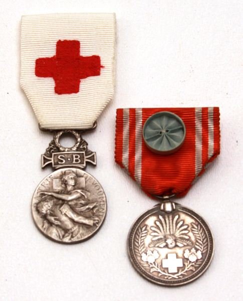 WWII JAPAN RED CROSS & FRENCH AID TO WOUNDED MEDAL: WWII Japanese silver medal with rosette and French Medal of the Society for the Aid to Wounded Soldiers, unnamed 1864-1866 in silver.