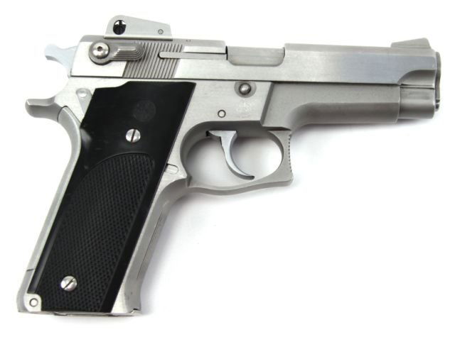 SMITH & WESSON MODEL 659 9MM PISTOL STAINLESS: Smith & Wesson Model 659 pistol in stainless steel. Bore is bright and clean, finish is 95%, and grips very good to excellent. Caliber: 9MM Serial #: TAR5204