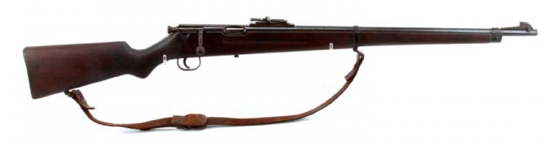 SAVAGE MODEL 1919 MATCH .22 CALIBER RIFLE: Savage Model 1919 Match .22 caliber rifle. bore appears good. bluing about 65%, with surface rust spots and handling wear. Stock shows a hairline fracture. Bore and action in need of cleaning. Overall