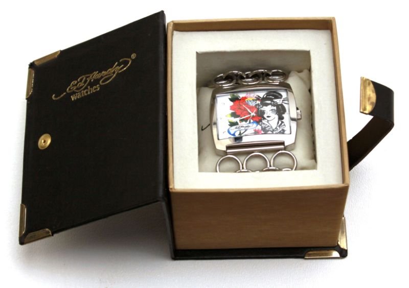 ED HARDY WOMENS WATCH STAINLESS STEEL 316L: Lynx Geisha Dragon, comes with case, pillow, extra link, and COA. Condition: Overall in very good working condition.