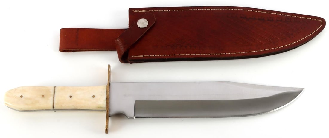 10" CHIPAWAY BOWIE KNIFE FULL TANG BONE HANDLE: Chipaway 10-inch bowie knife with smooth bone handle and brass crossguard. Ricasso marked "Chipaway Cutlery." Includes embossed leather holster. Overall length 15 inches. Blade 10 inches. Good conditi