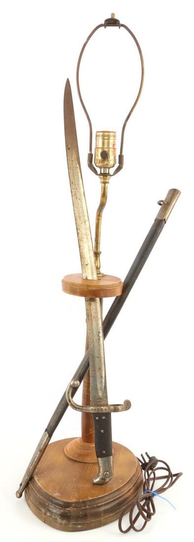 WWI GERMAN M1871 SOLINGEN SWORD BAYONET LAMP: Early pre-1940 plug-in lamp, not tested. Rewiring suggested. Bayonet and scabbard are fixed. Light surface rust. Otherwise, good original condition. 7 X 31 inches. Very good condition. This lot has a 
